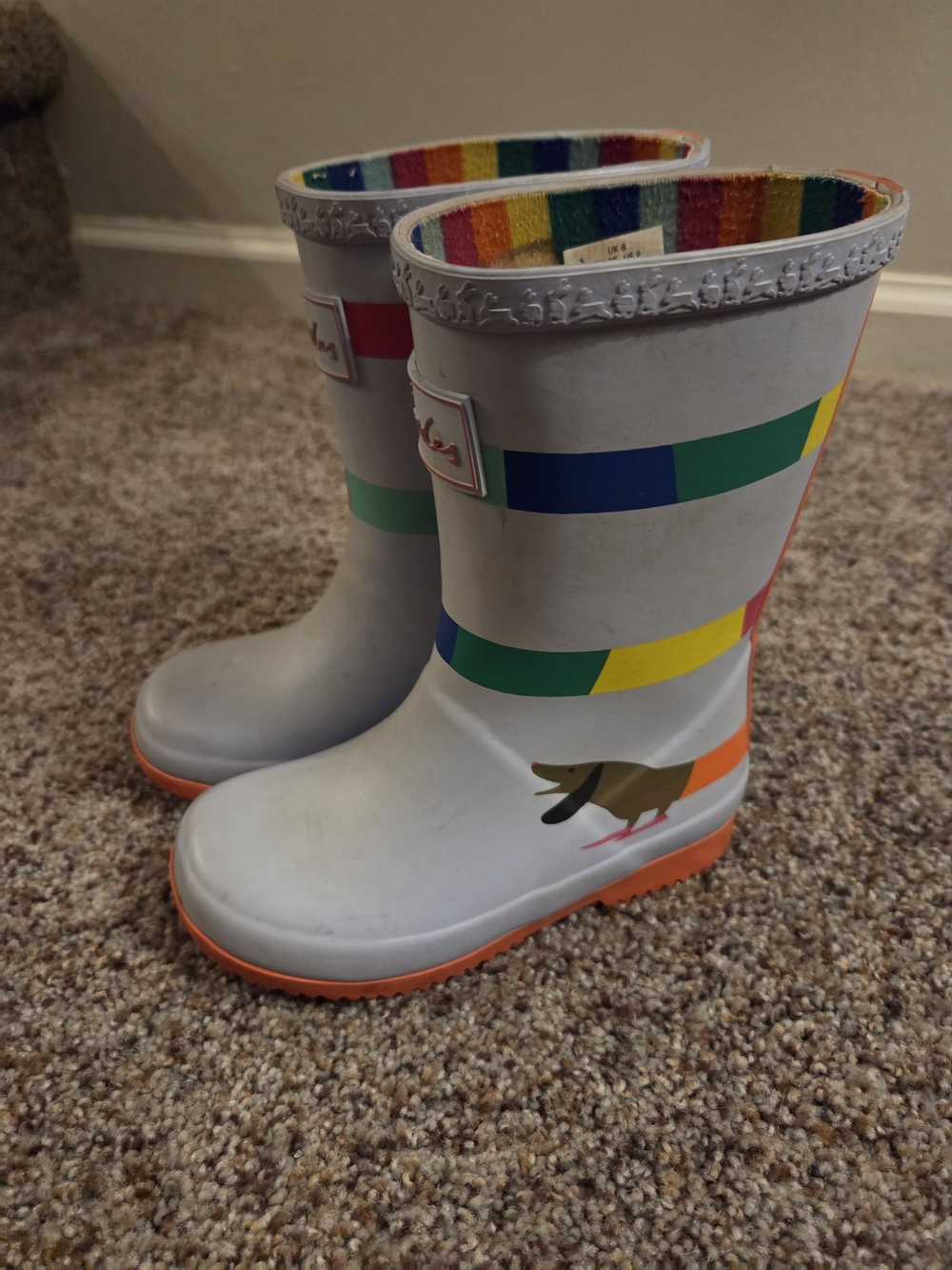 Joules Light Gray Kids Rain Boots with Rainbow Stripes and Orange Sole